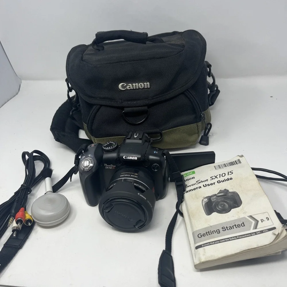 Canon PowerShot SX10 IS 10.0MP Digital Camera With Bag -Black Tested